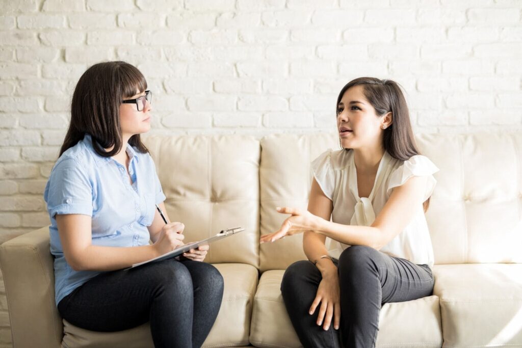 a woman with depression talking to her therapist