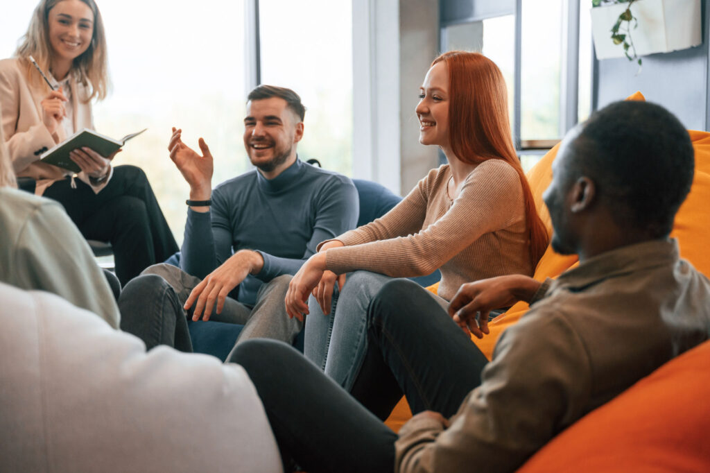 group of young adults in group therapy