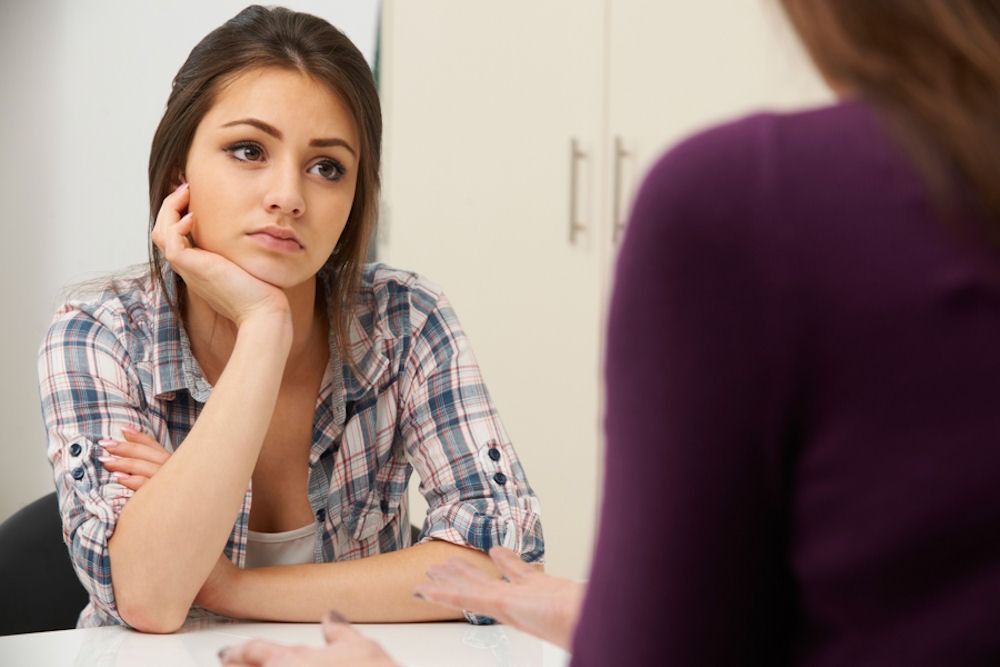 teen receiving therapy