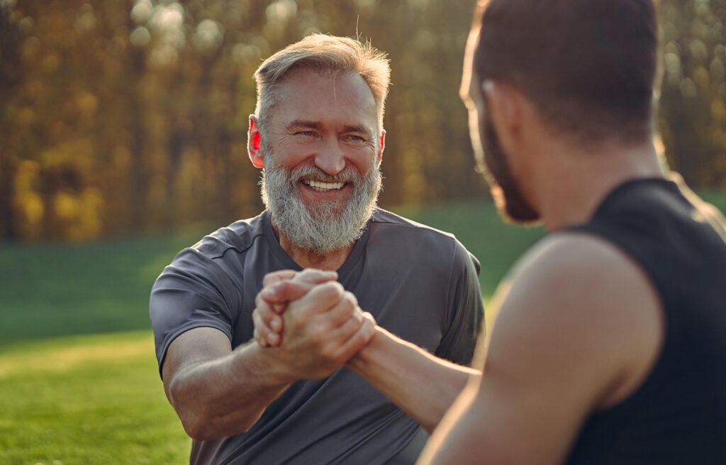 two men celebrating sobriety