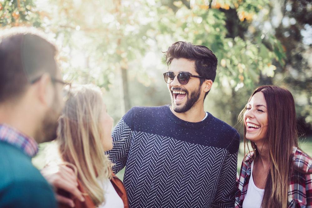 man enjoying sobriety with friends