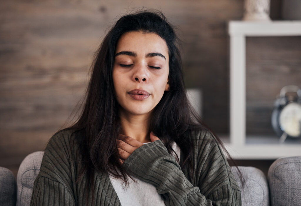 woman struggling to breathe due to drug use