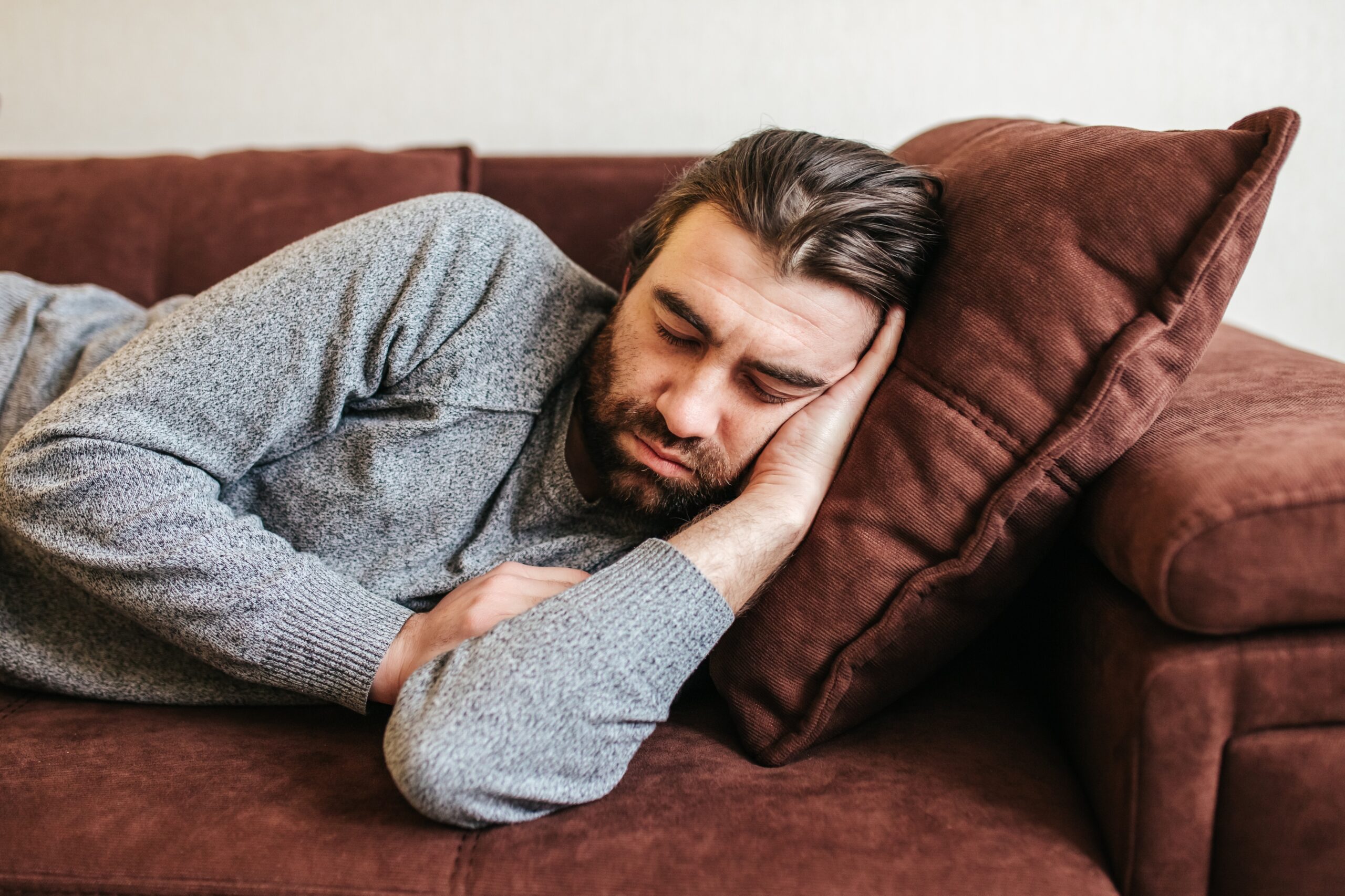 man struggling with ecstasy withdrawal symptoms